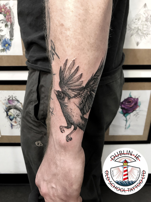 bird in flight tattoo